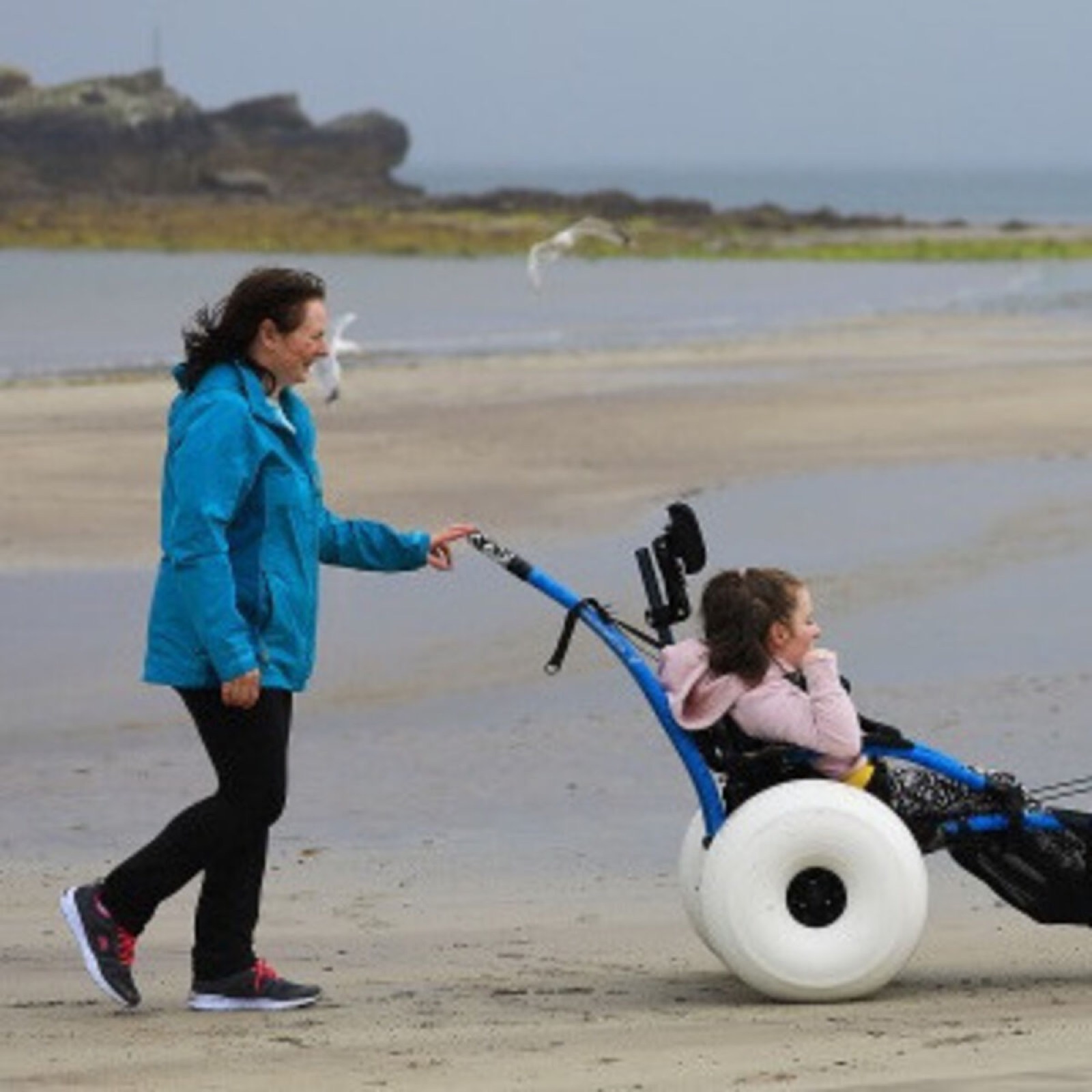 An accessible boardwalk leading onto a Northern Ireland beach