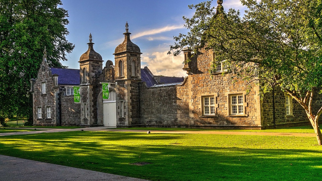 Clotworthy House, the old stone stable block that houses the arts centre and café, in evening light