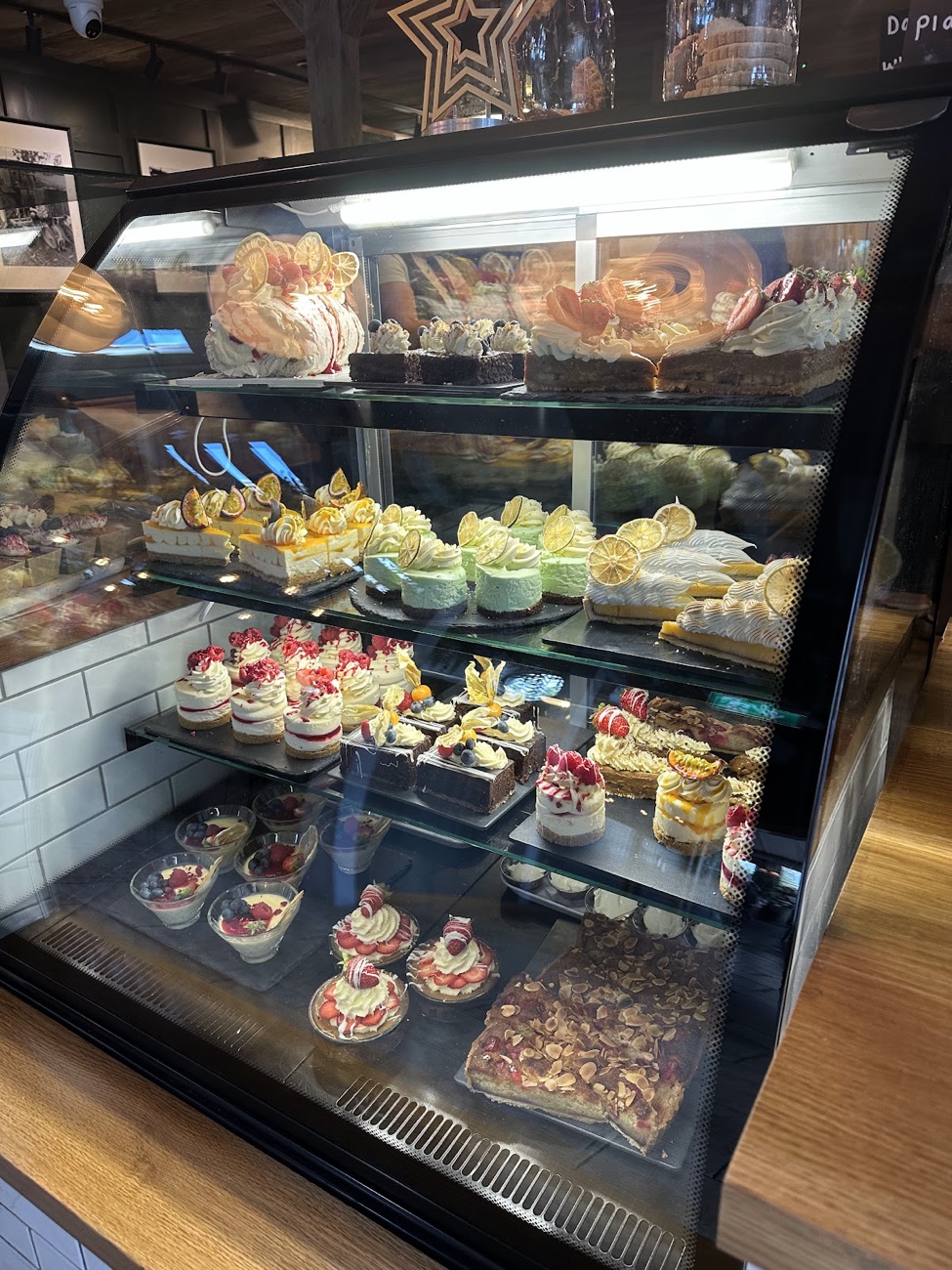 The Ashvale cake counter stacked with cheesecakes, meringues, tarts and traybakes
