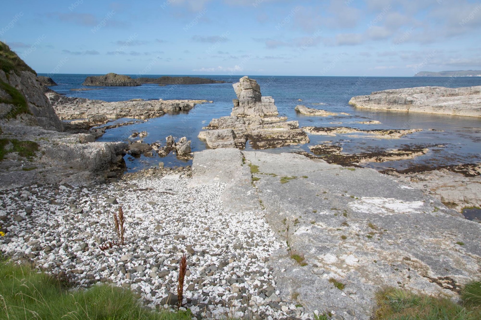 The rugged limestone foreshore and sea stacks along the coast at Ballintoy