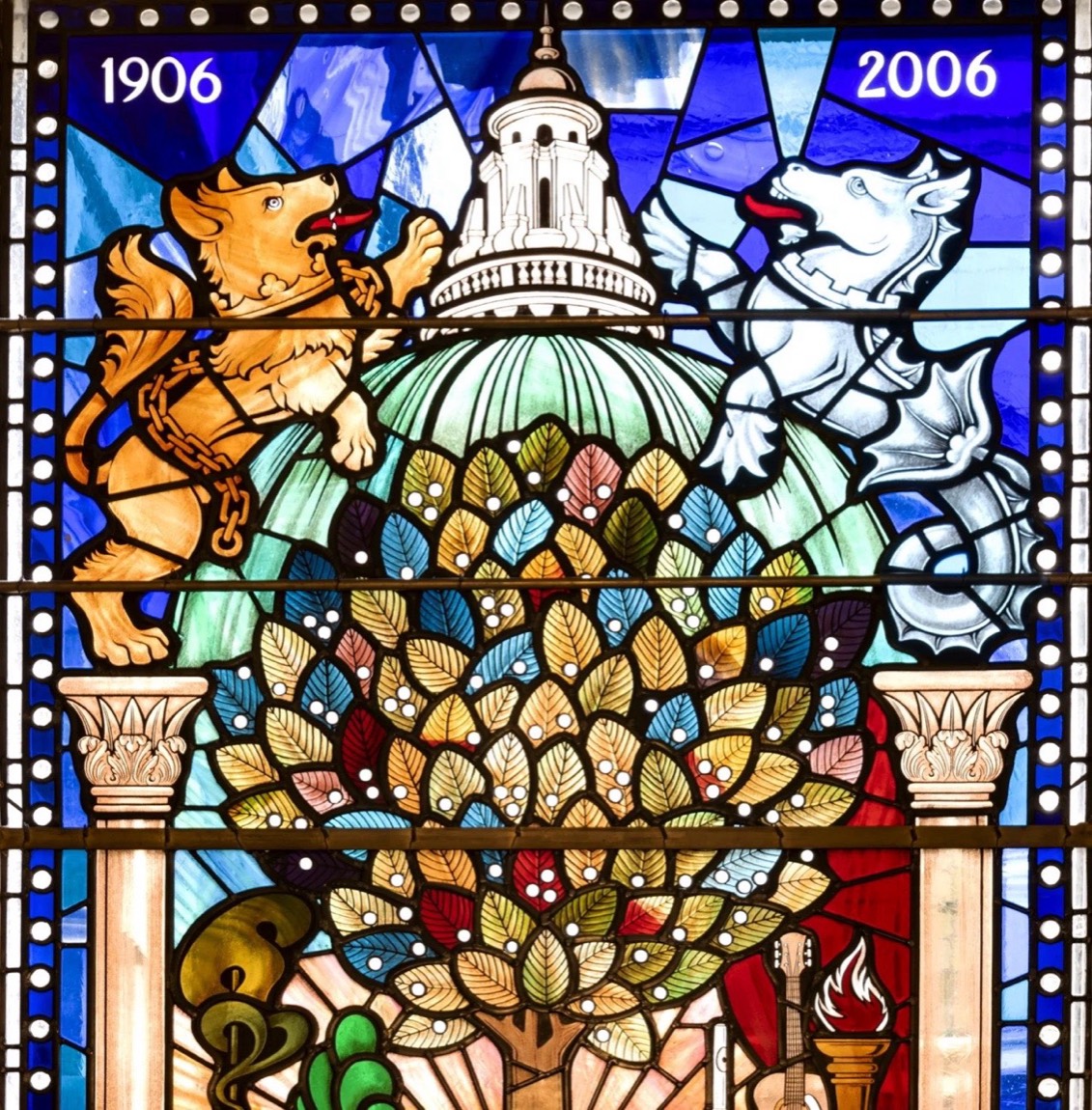 A colourful stained-glass window inside Belfast City Hall marking the building's 1906 to 2006 centenary