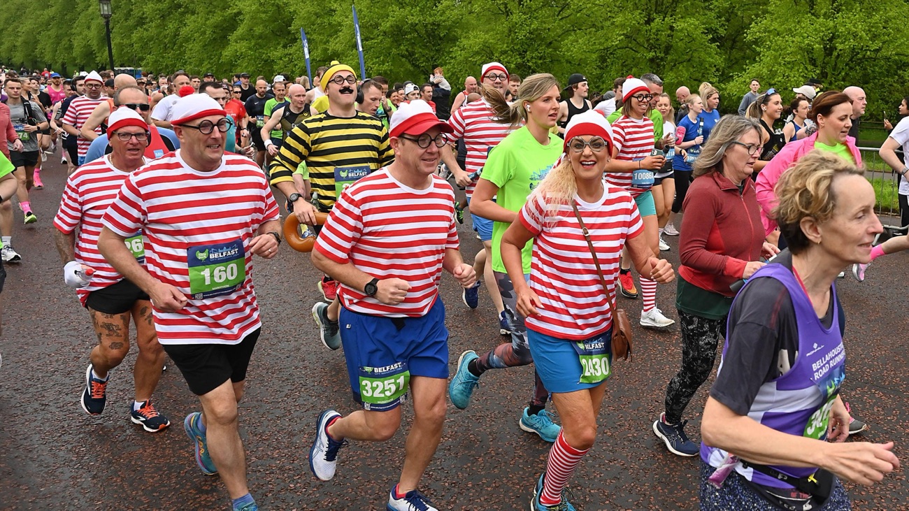 Runners in fancy dress, including Where's Wally costumes, taking part in the Belfast City Marathon