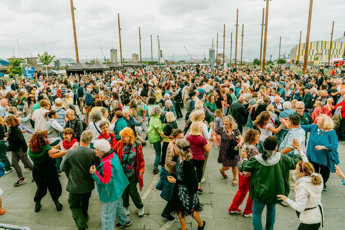 Hundreds of dancers at the open-air Titanic Céilí on Belfast's Maritime Mile