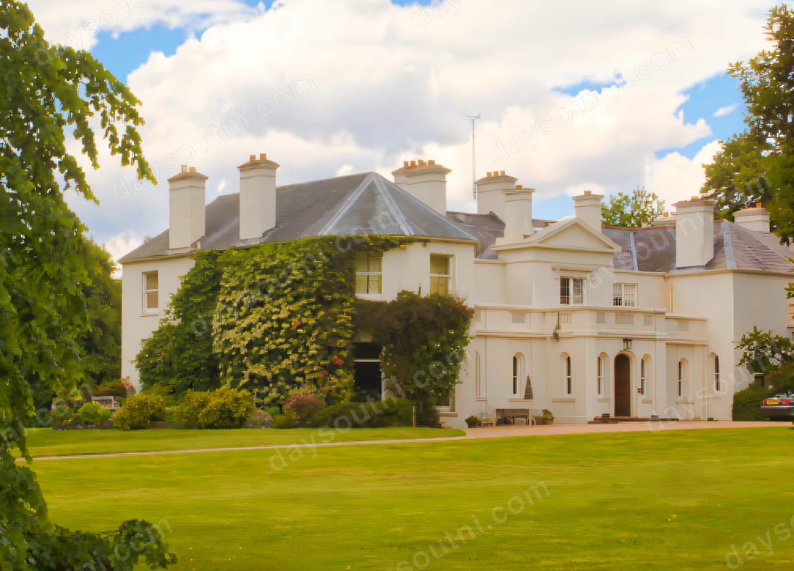 The white period house at Benvarden behind sweeping lawns