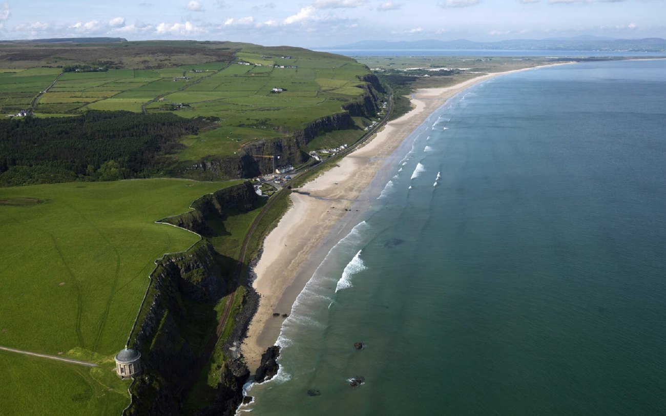The vast sweep of Benone Strand below Binevenagh