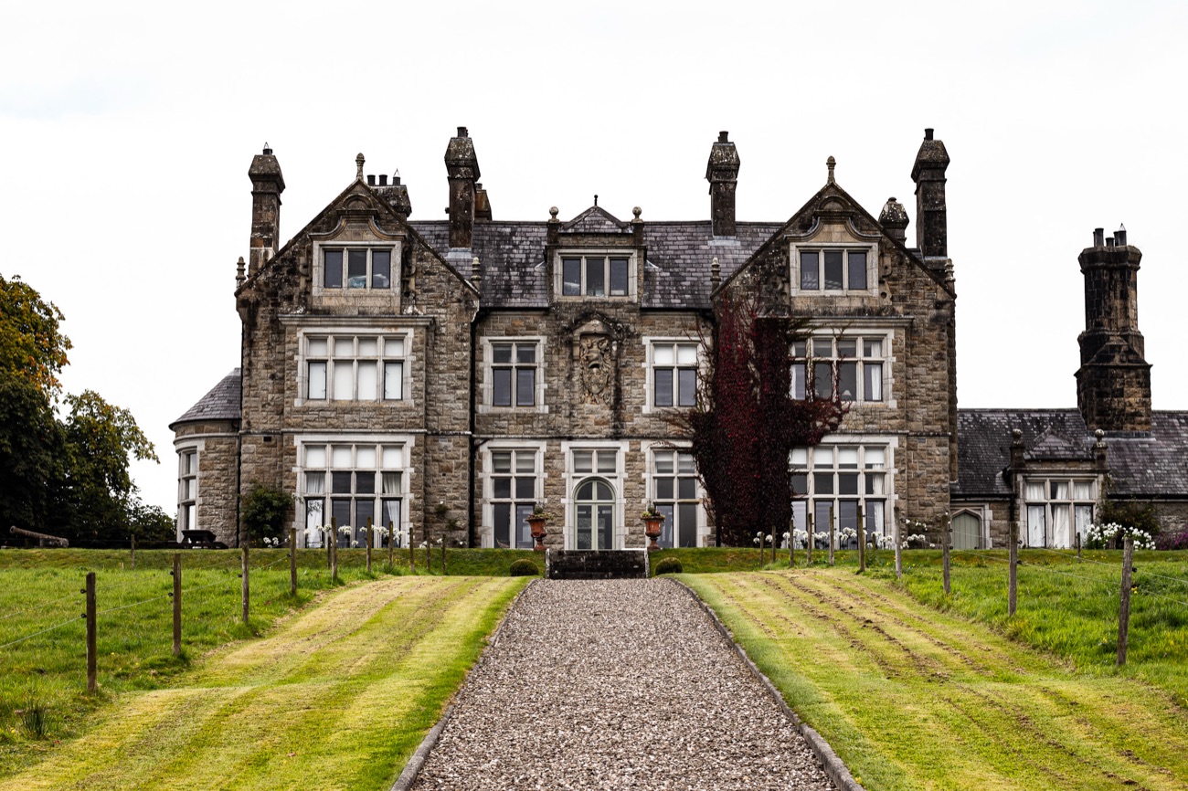The grey-stone Victorian manor at Blessingbourne, seen head-on across the lawn