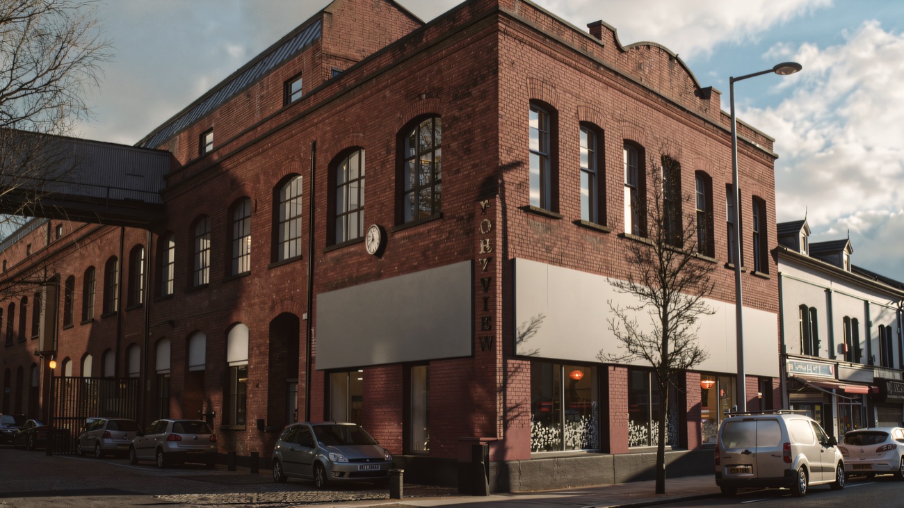 Street view of the corner of the old red-brick mill building the brewery sits in