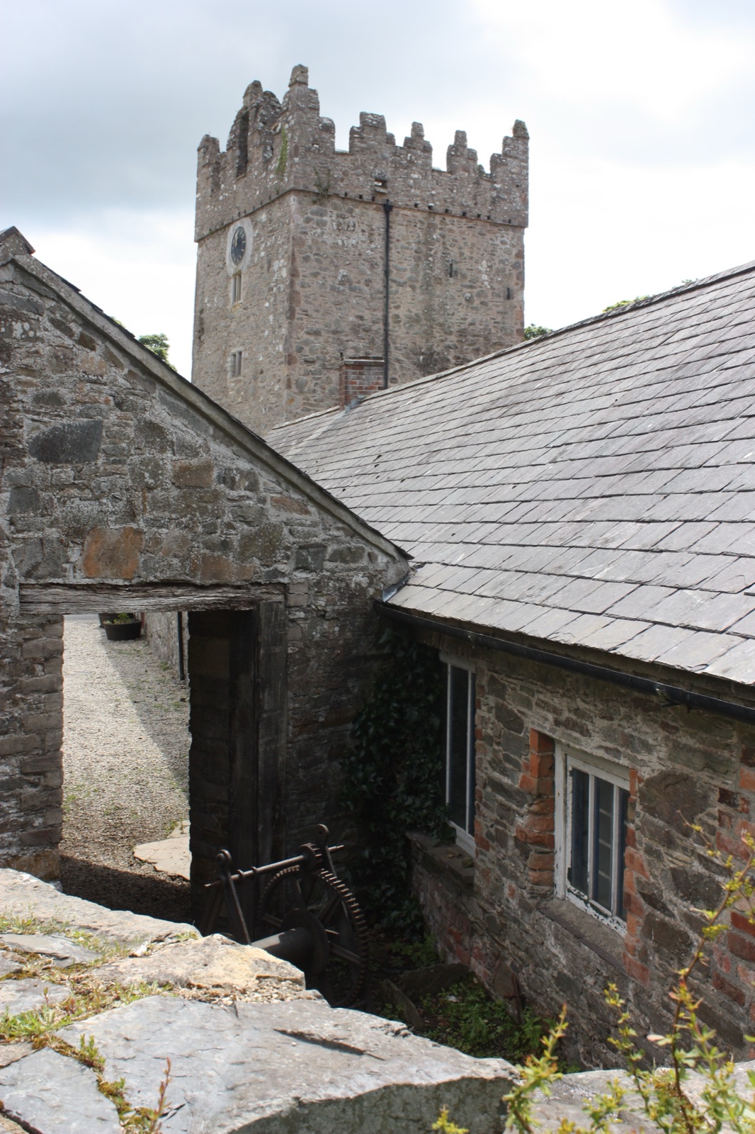 The stone farmyard at Castle Ward with its tall tower house — the courtyard used as Winterfell in Game of Thrones
