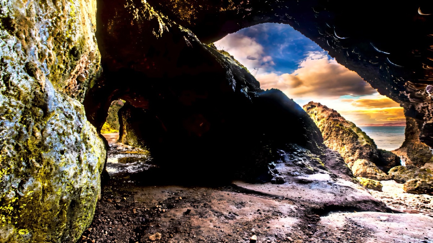 The red sandstone sea caves at Cushendun