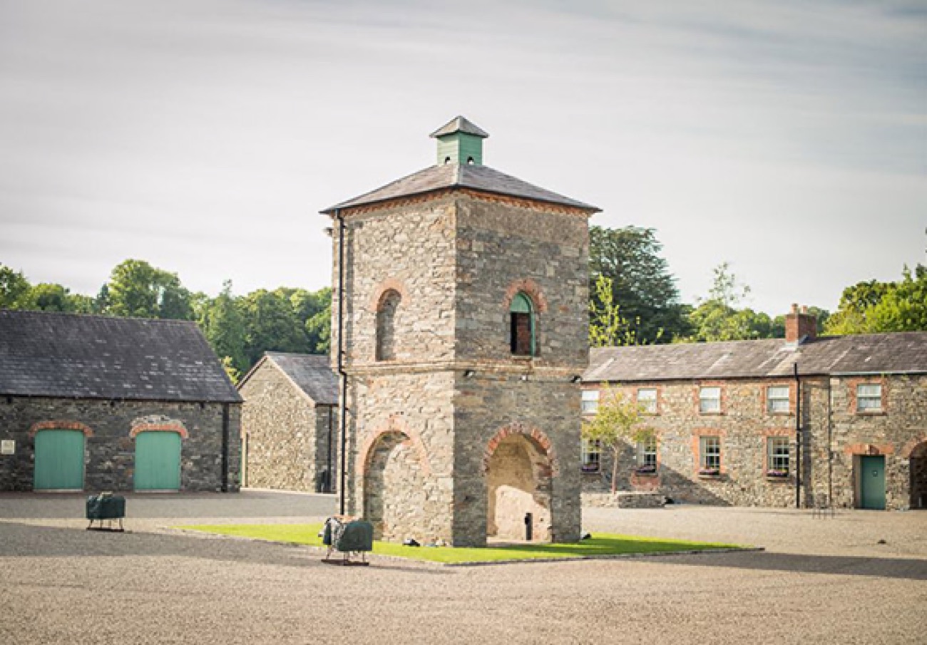 The 18th-century stone courtyard at Clandeboye with its central arched tower