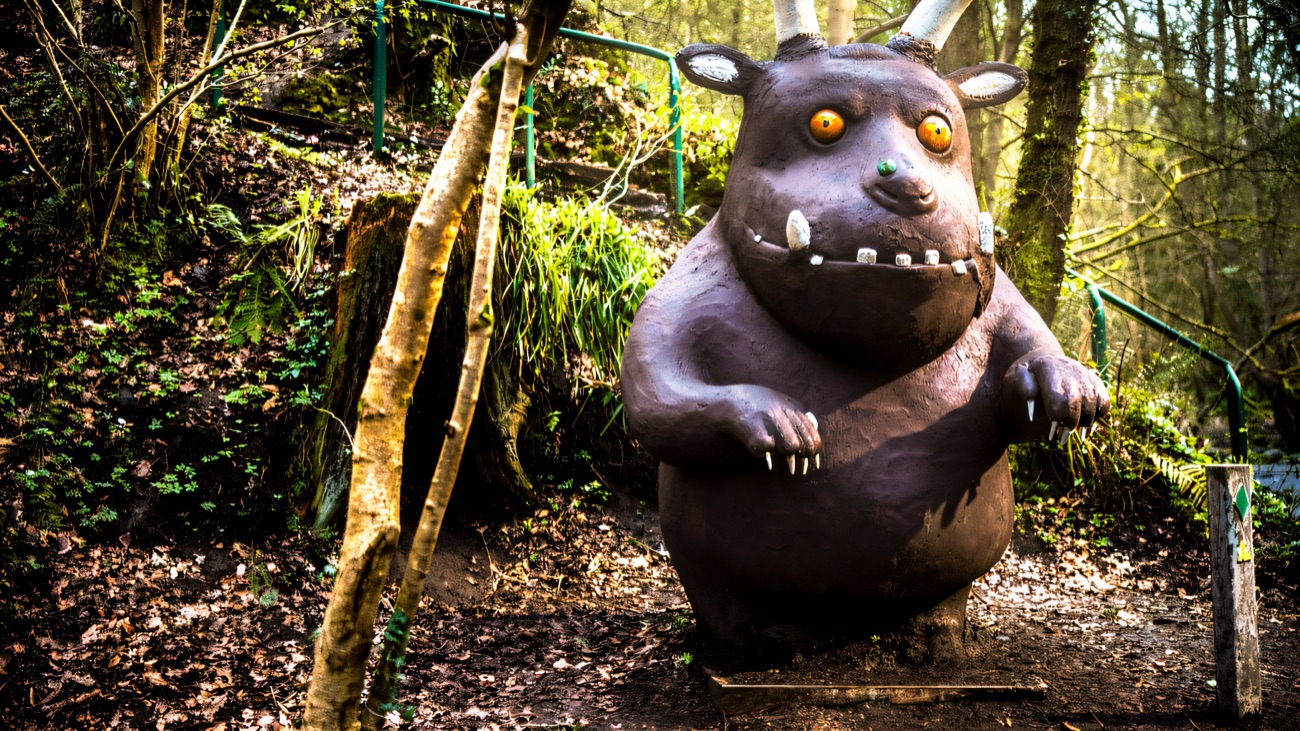 The Gruffalo sculpture standing on the woodland trail at Colin Glen