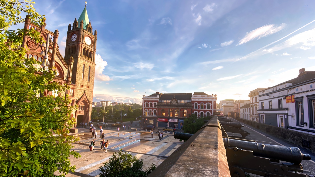 Guildhall Square and its clock tower seen from the cannon-lined ramparts of the Derry Walls