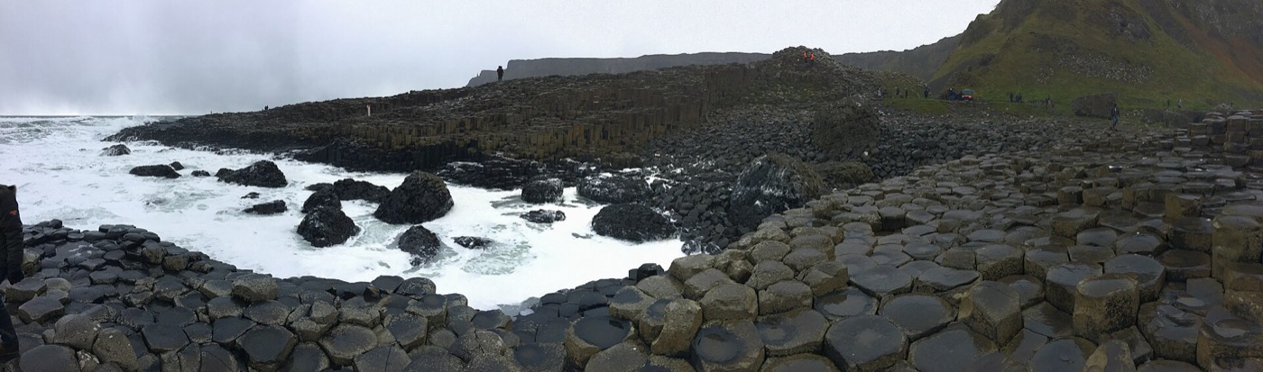 Wide view of the Giant's Causeway and crashing sea