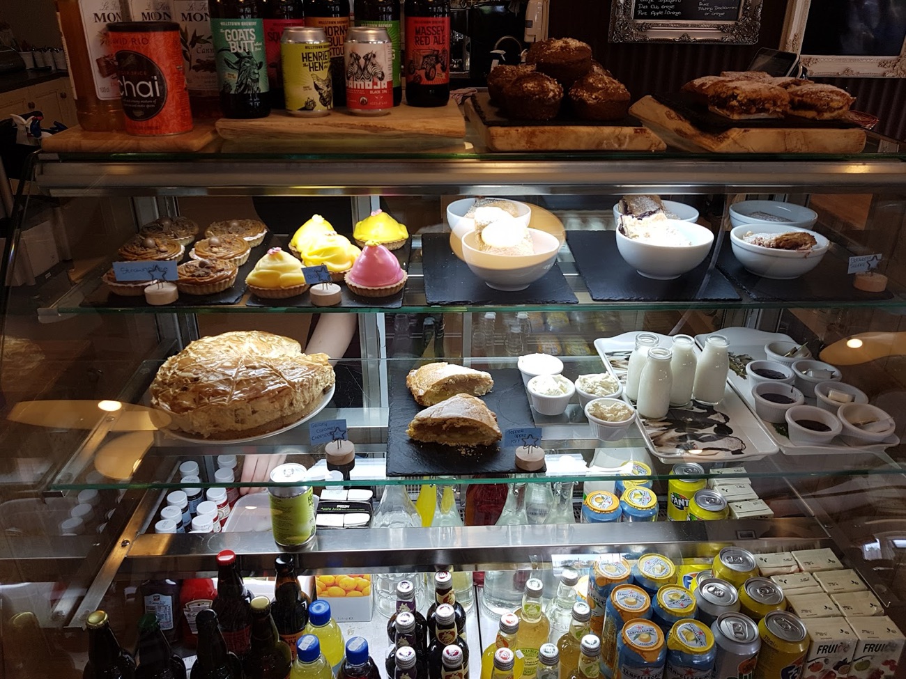 A glass counter of pies, cakes and desserts at Hillstown