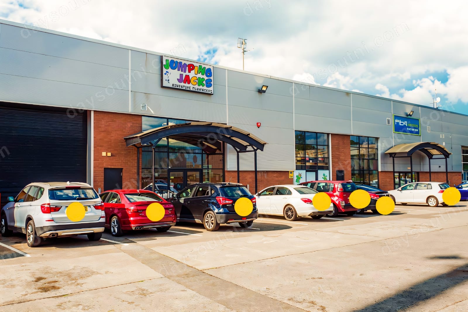 The exterior of Jumping Jacks Adventure Playcentre at the Riverside Centre in Lisburn, with its colourful sign above the entrance