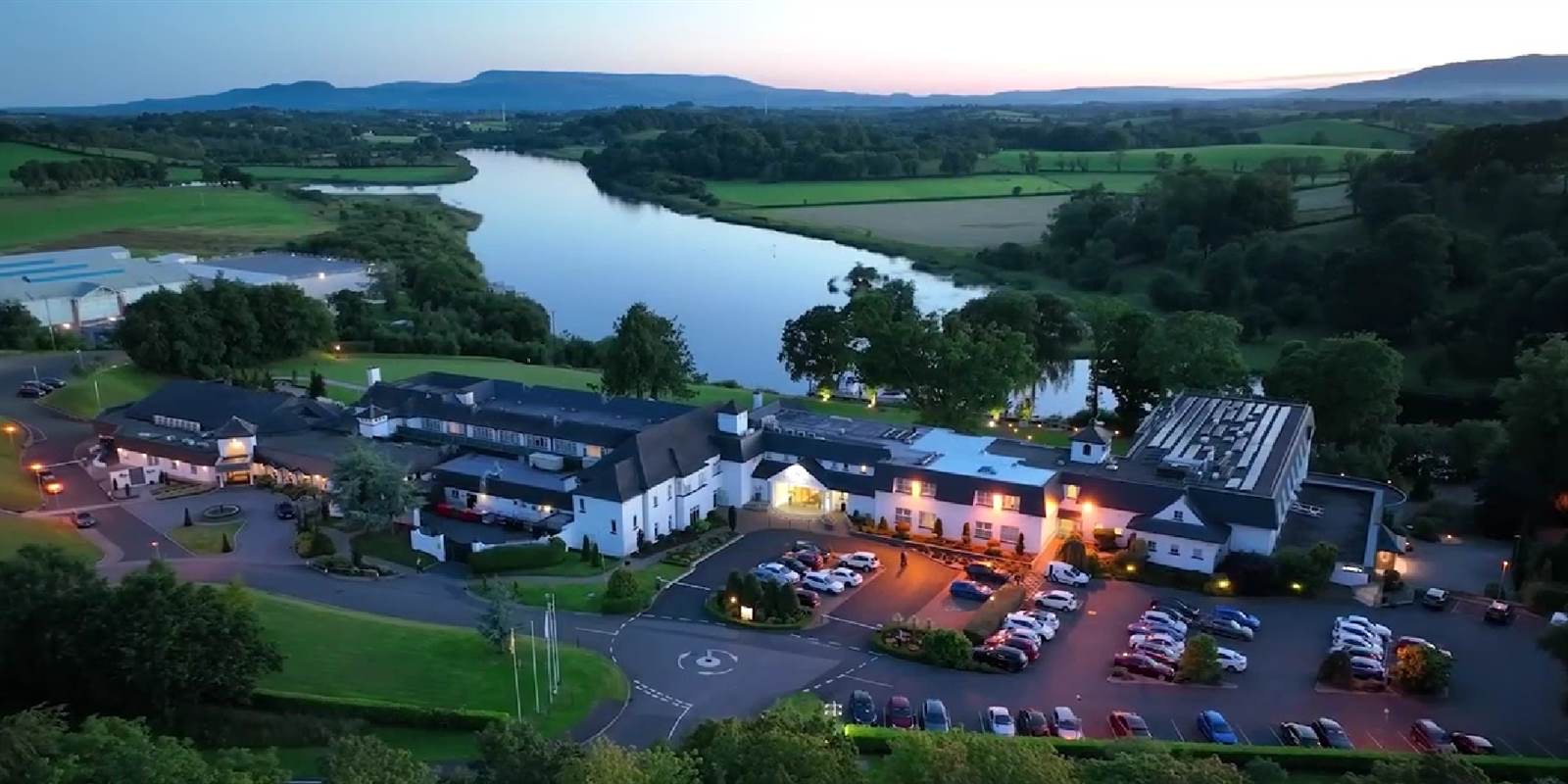 Killyhevlin Lakeside Hotel from the air at dusk, on the shore of Lough Erne.