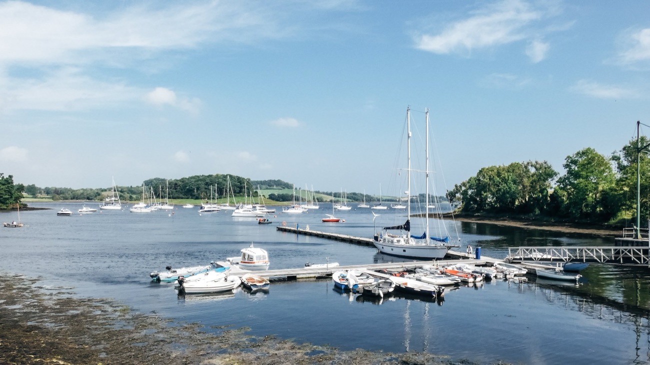 Boats moored at Killyleagh harbour on Strangford Lough on a bright day
