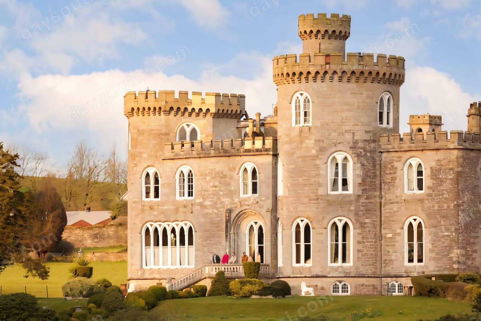 Killymoon Castle, a turreted grey-stone Gothic castle with pointed windows above green parkland near Cookstown
