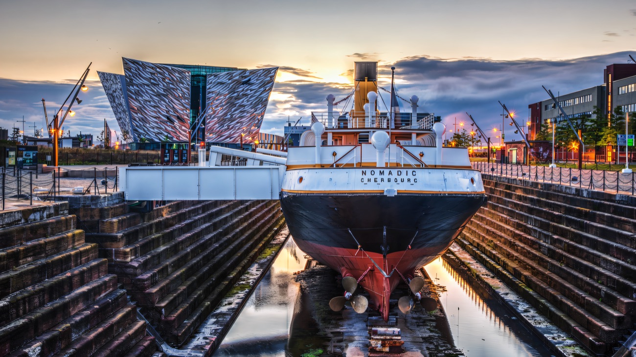 SS Nomadic and Titanic Belfast together as the sun goes down