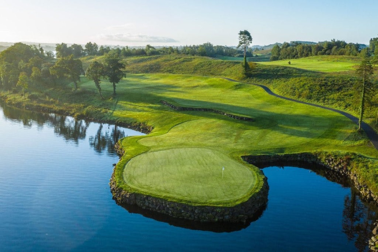 A green on the championship Faldo golf course, ringed by the lough