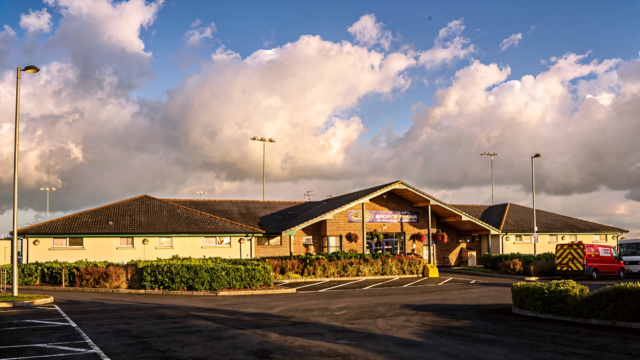The arena entrance and stand, with the Mid-Ulster Sports Arena sign