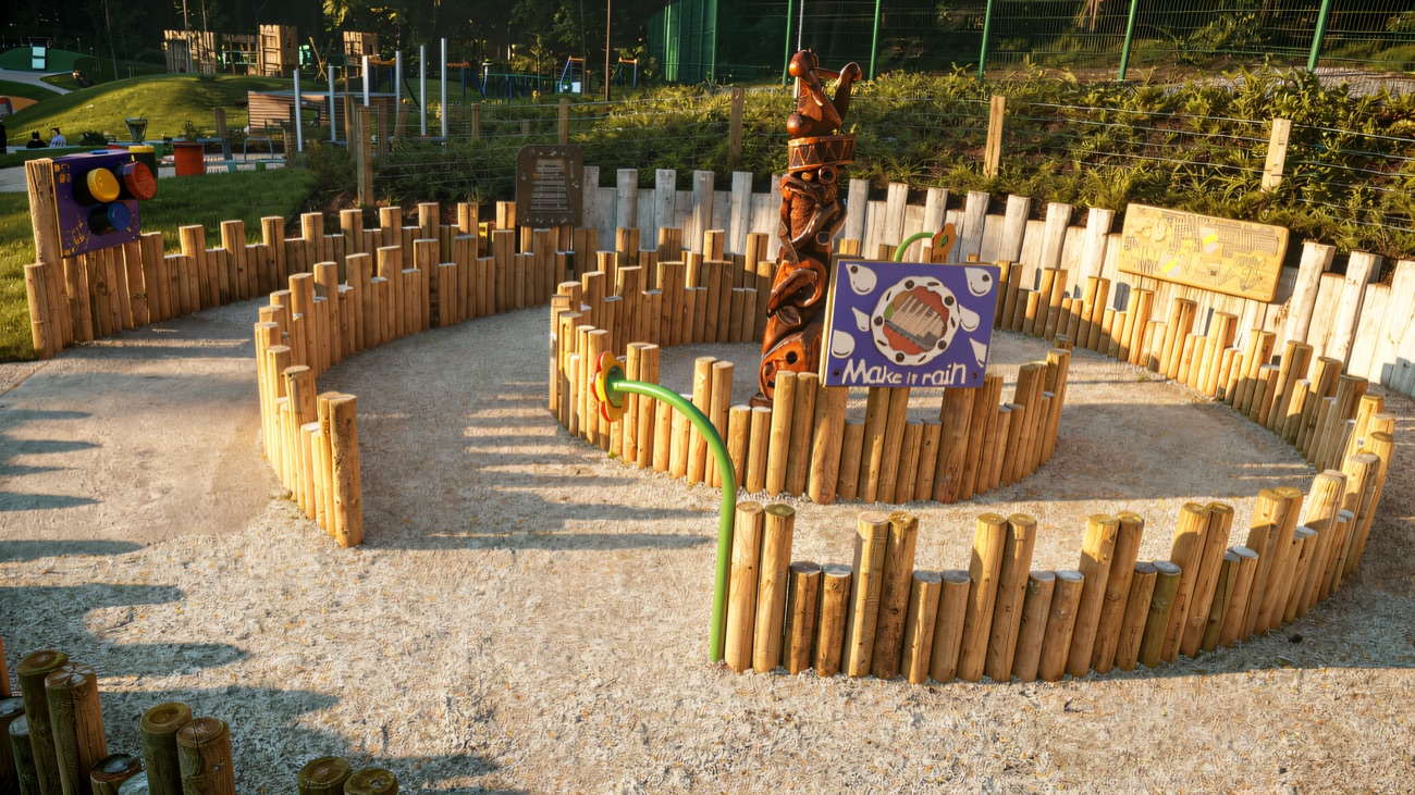 A circular timber-post enclosure with a carved totem in the centre at Mo Mowlam Play Park
