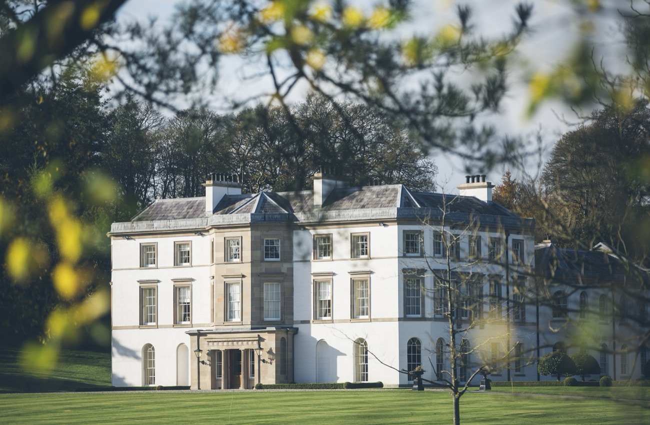 The Montalto Mansion front, framed by autumn foliage