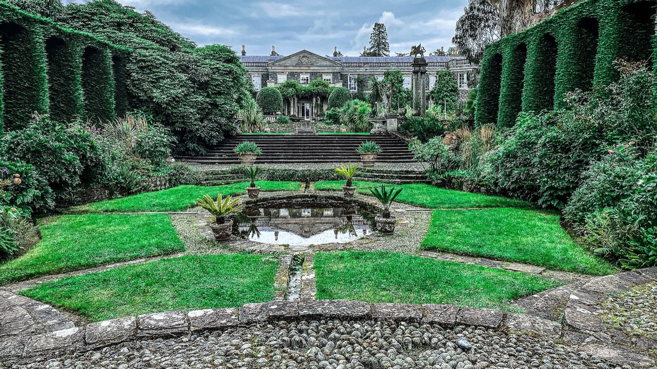 The formal sunken garden framed by clipped hedges
