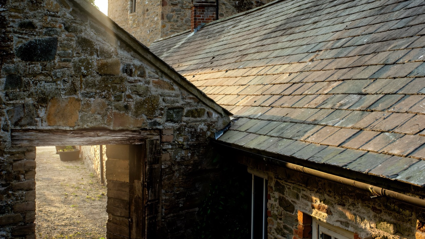 The stone farmyard buildings at Castle Ward