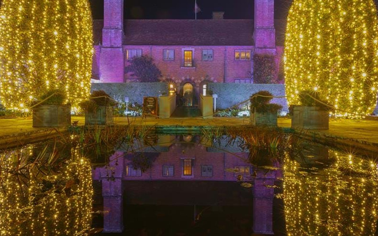 The illuminated walled garden and turrets of Glenarm Castle at Christmas