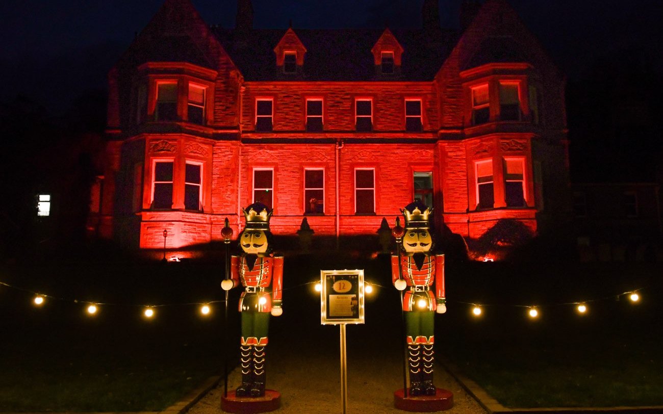 A lantern-lit Christmas trail through the woods at Magheramorne Estate