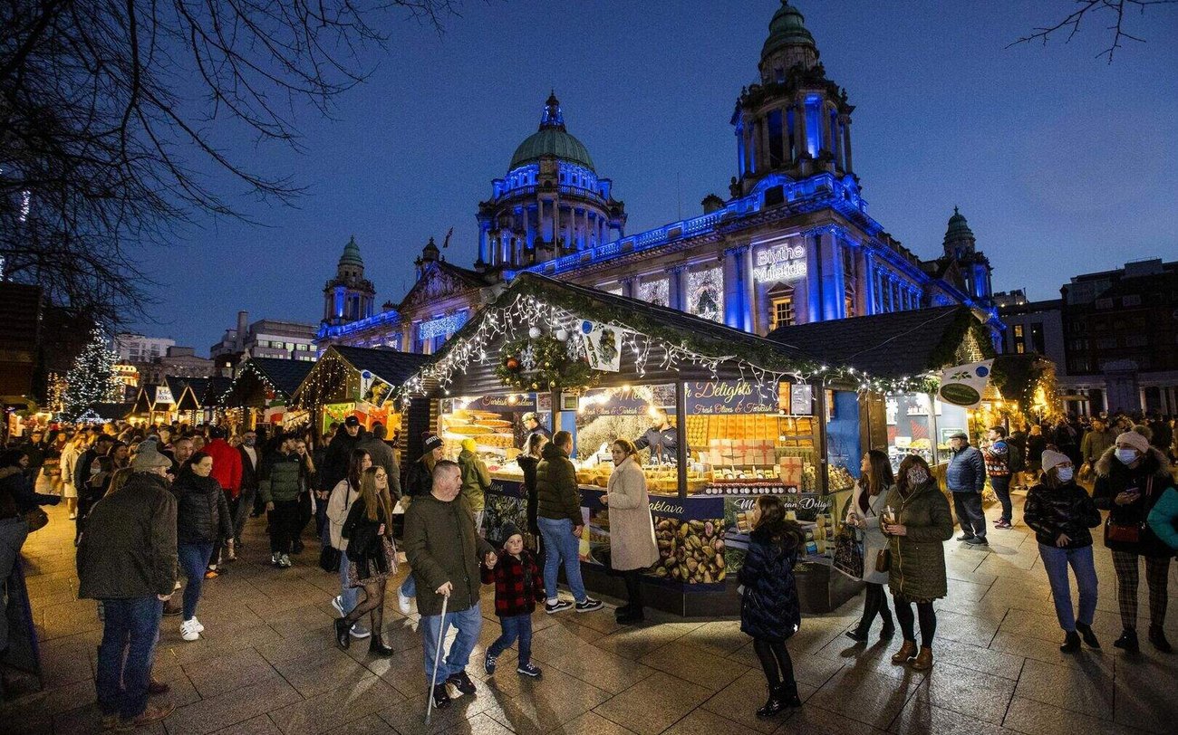 Christmas market stalls and lights in Derry's Guildhall Square
