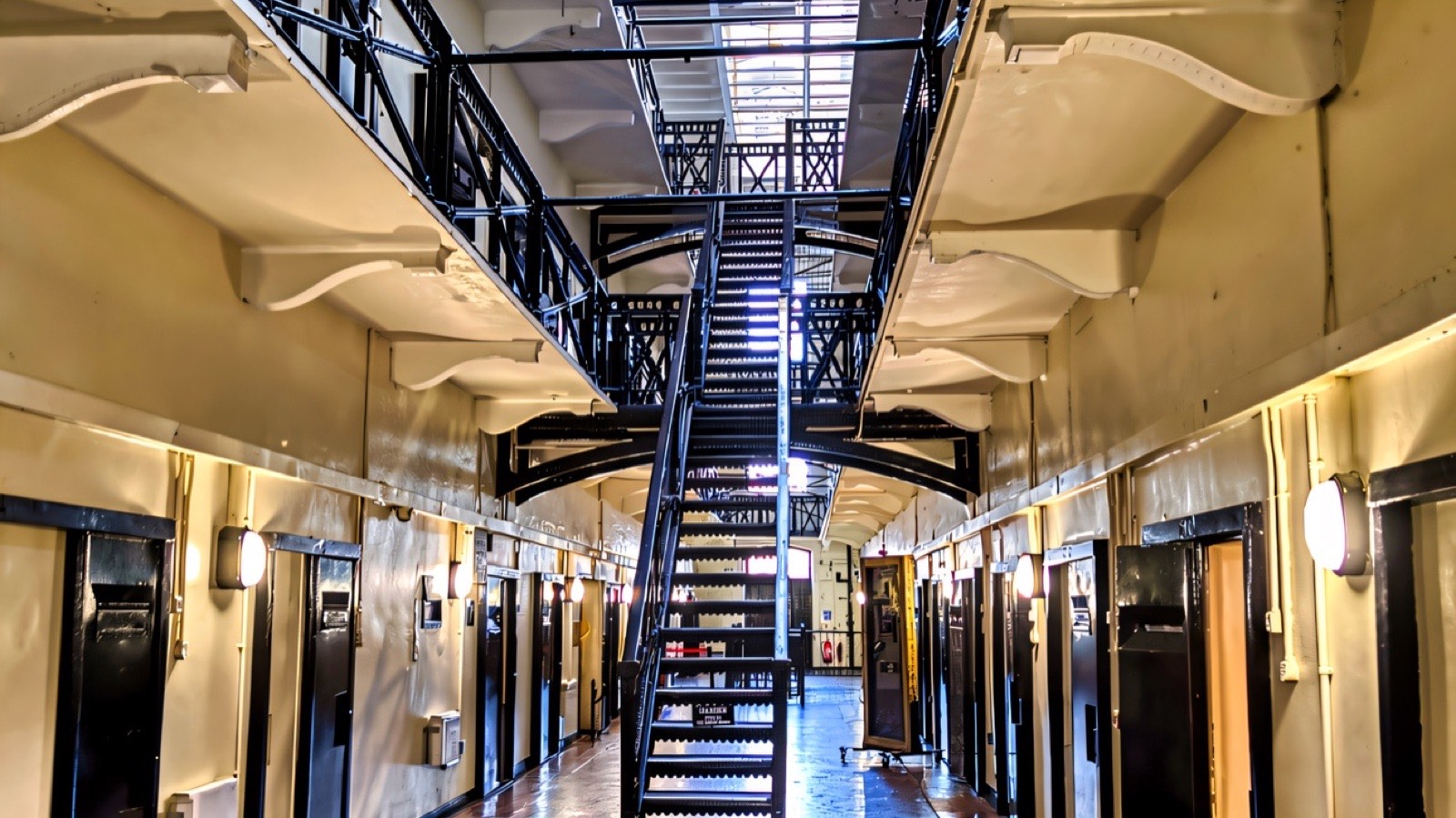A candlelit corridor in a haunted historic building