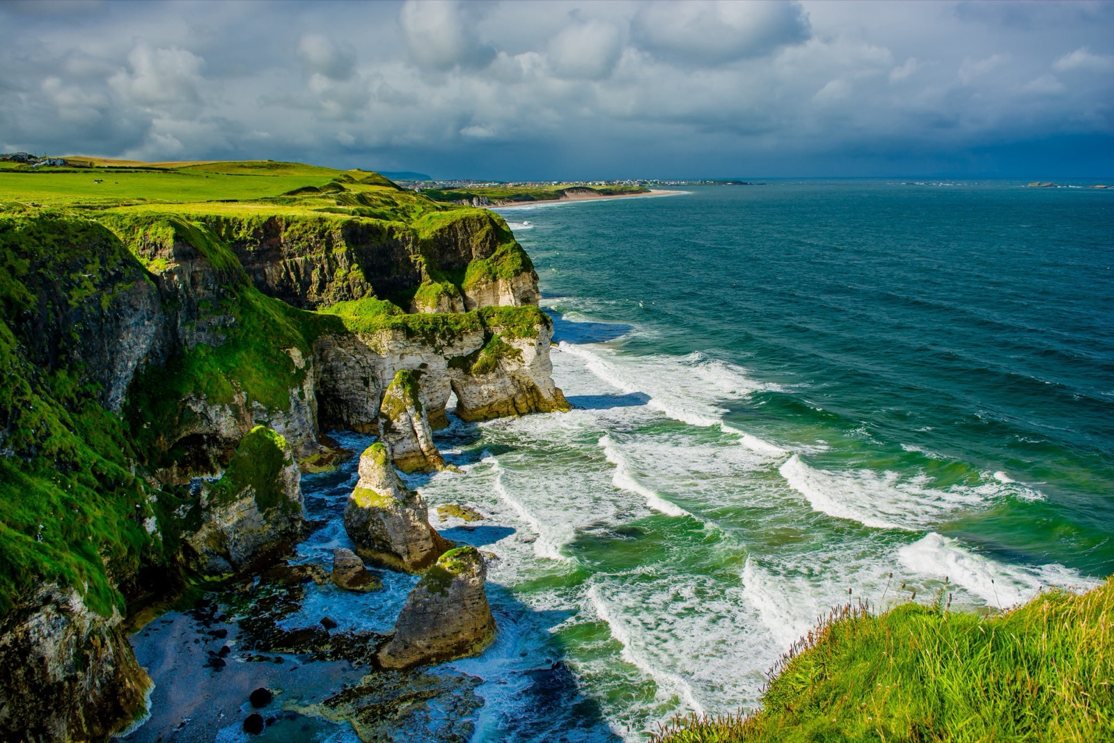 Cliffs and turquoise sea on the Causeway Coast