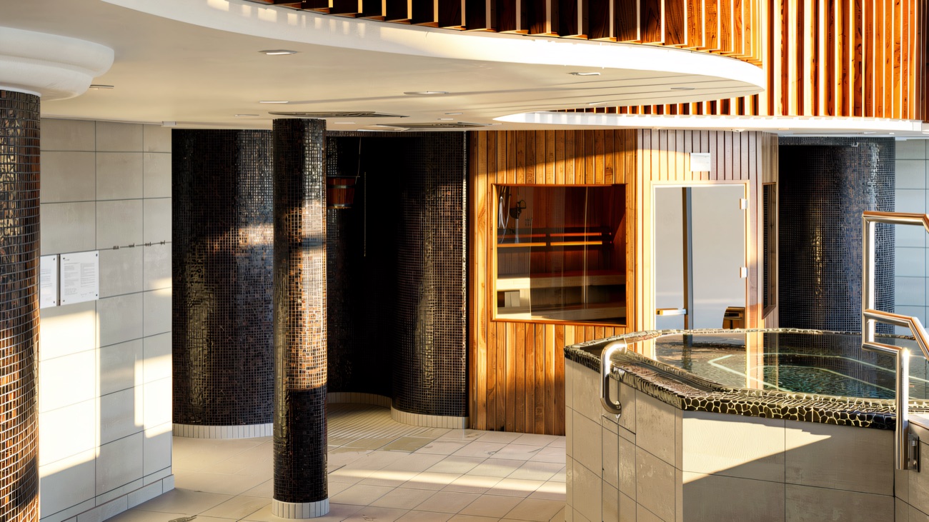 The wellness suite with its slatted timber ceiling and mosaic-tiled columns