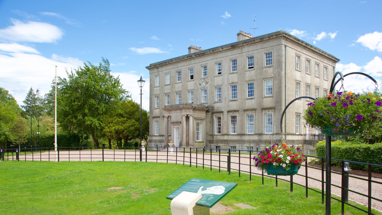 The grand stone Archbishop's Palace across the demesne lawns