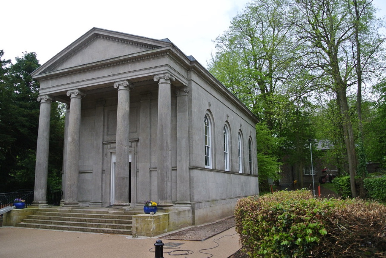 The Primate's Chapel, a small Ionic-columned temple in the trees