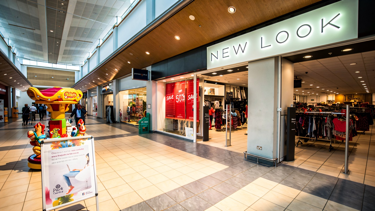 Inside the Park Centre — the New Look shopfront and a children's ride on the mall floor