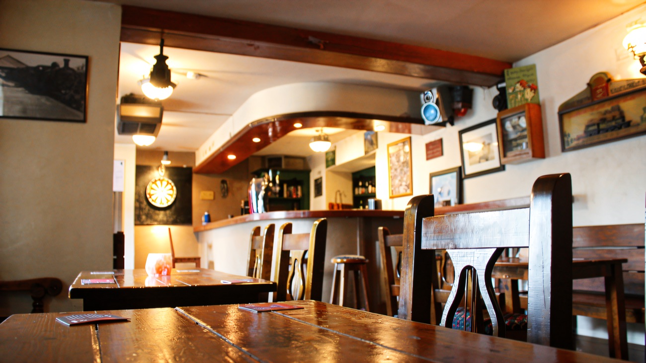 Railway photographs and memorabilia on the wall inside the bar