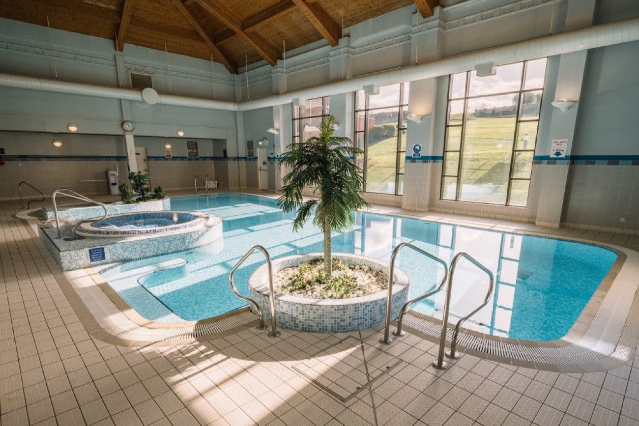 The indoor leisure pool and spa pools at the resort's leisure club