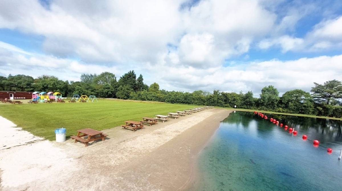 The inland white-sand beach and clear water at Rosepark Farm