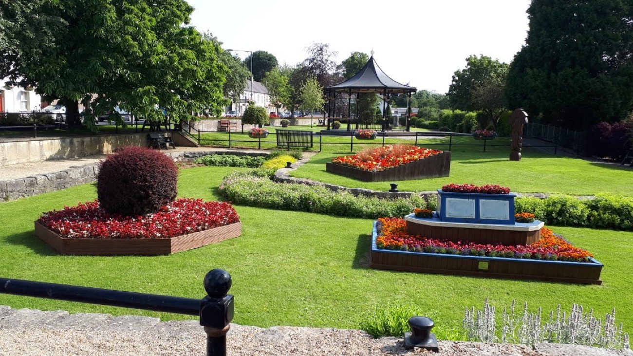 Formal flower beds and a bandstand in the park at Scarva