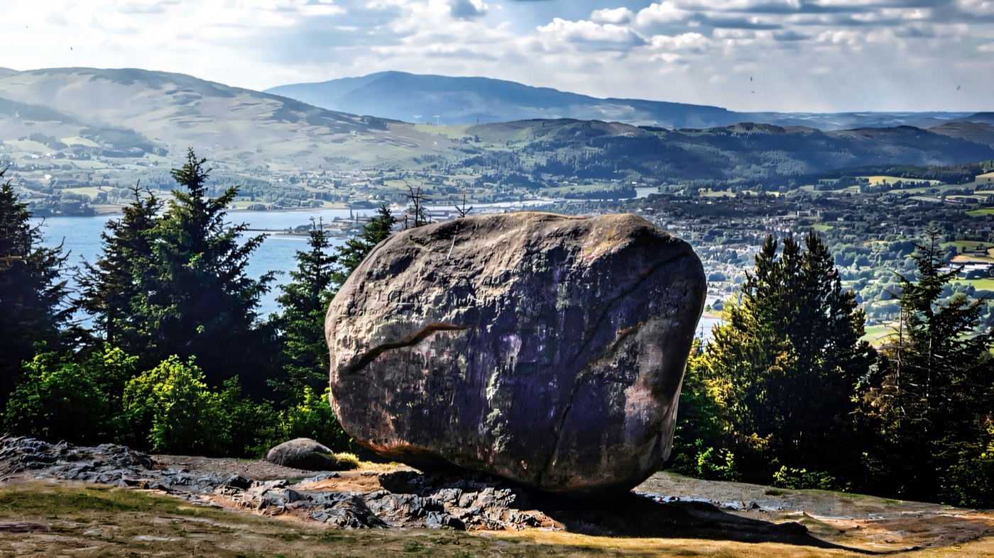 The Cloughmore Stone above Kilbroney Park, with Carlingford Lough beyond