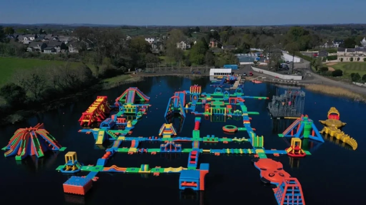 Aerial view of the whole floating aqua park across the lake