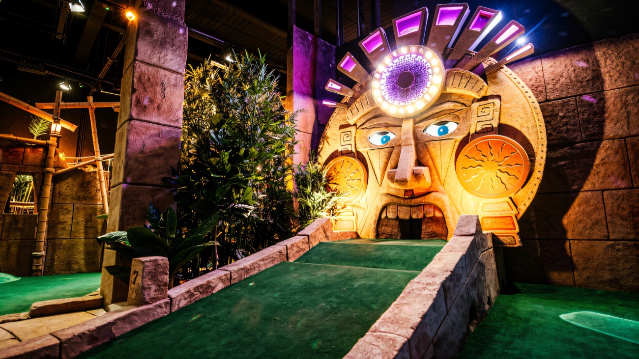 The glowing Sacred Mask hole dares you to putt straight through it