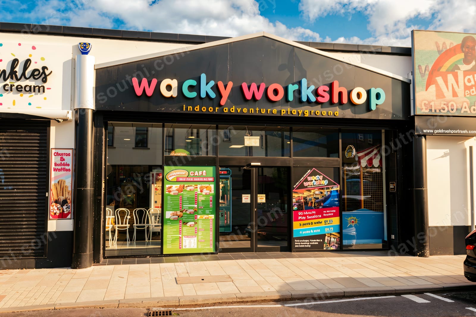 The colourful shopfront of Wacky Workshop indoor adventure playground in central Portrush, with the Avenue Café and Sprinkles ice cream alongside
