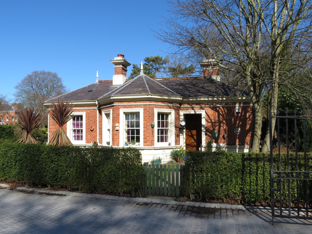 The Victorian red-brick gate lodge at the entrance to Wallace Park
