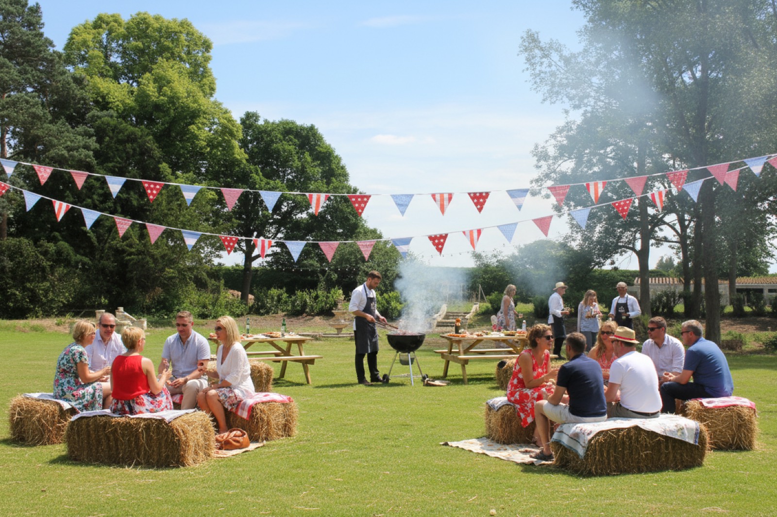 Families at an outdoor summer festival with bunting in Northern Ireland