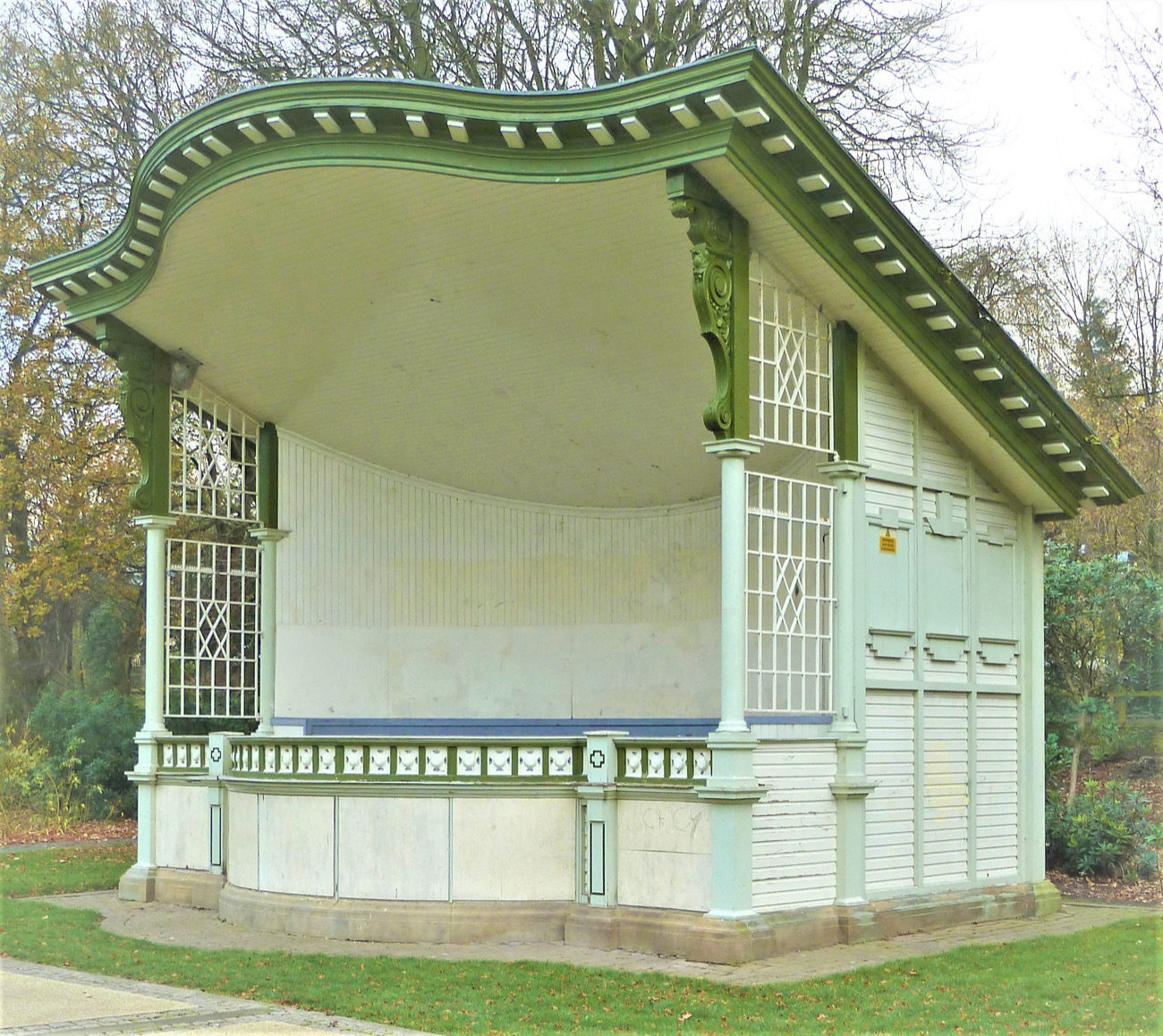 Close detail of the restored bandstand's ironwork and glazed panels